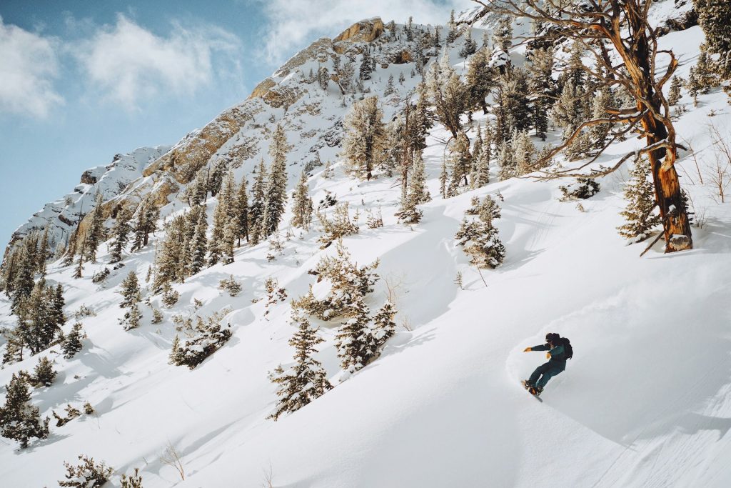 A person willing to feel the cold so they can snowboard